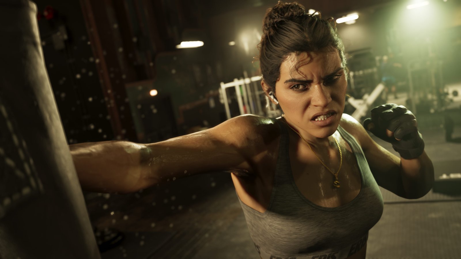 Lucia mid punch in a boxing gym.